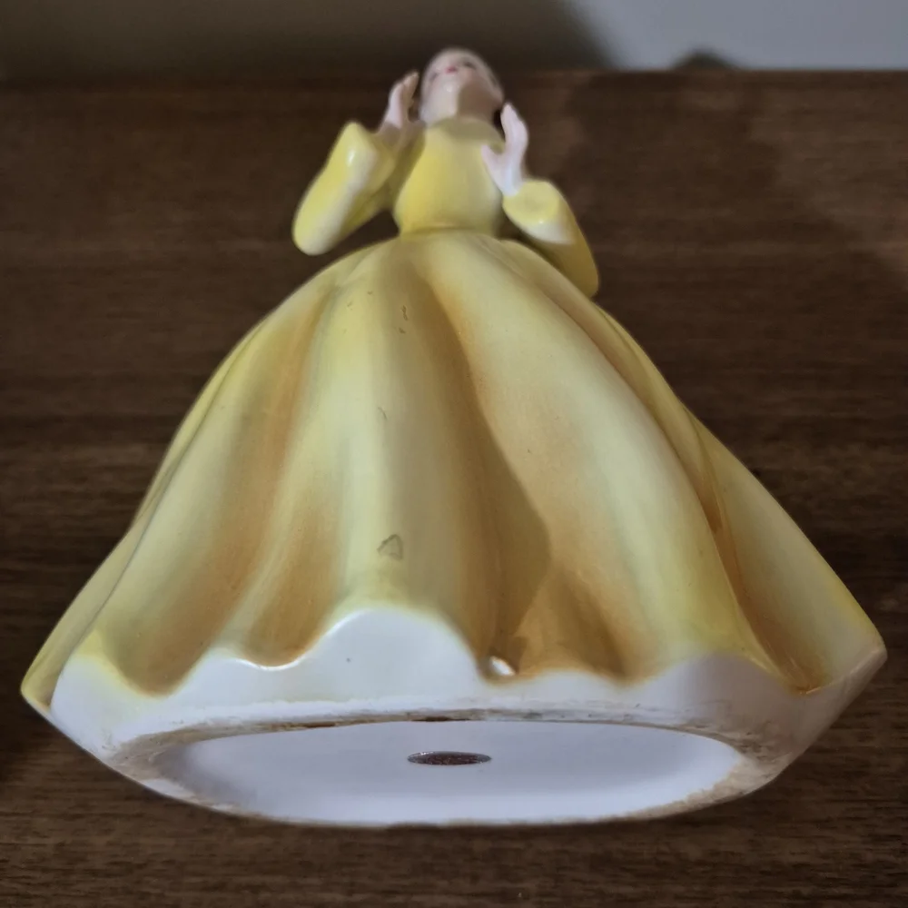 Vintage Yellow Ceramic Figurine